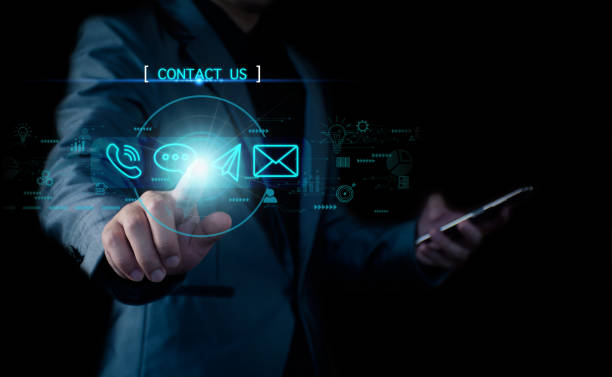 istock Concept Contact us or connected customer support hotline. businessman touching icon to communicate on a virtual screen,through a digital, global network. Icon (Email,Live Chat,Internet,Phone, Message) 1396414810