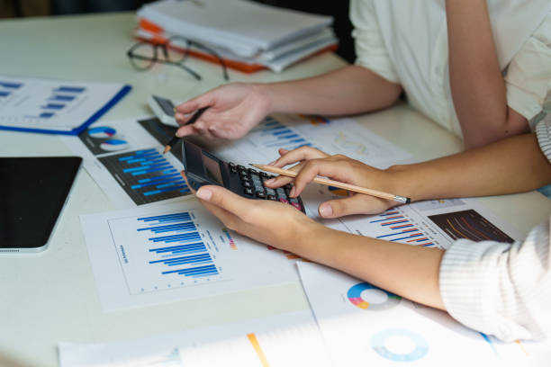 istock Group of Businesswoman and Accountant checking data document on digital tablet for investigation of corruption account. Anti Bribery concept. 1396416181
