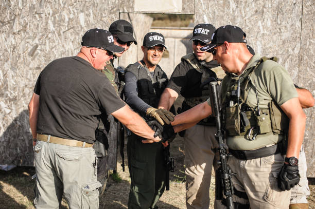istock Soldiers do a group salute with hand on the hand 1396417678