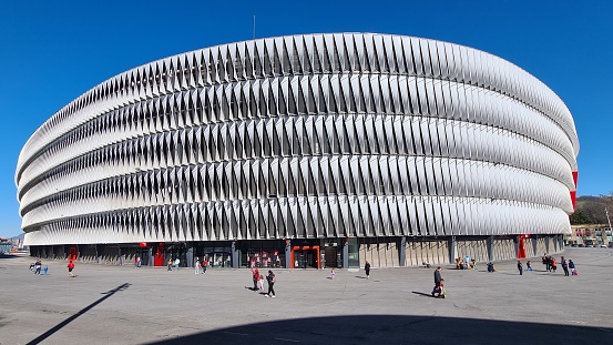 Bilbao, Spain – February 26, 2022: Façade of San Mamés Stadium, also called La Catedral, where Athletic Club de Bilbao plays as a local team.