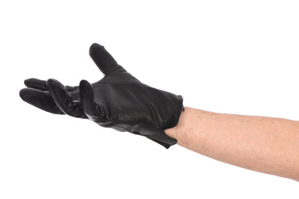 istock Man wearing black leather glove on white background, closeup. 1396422001