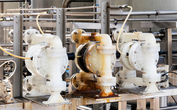 istock White motor for pumping water for delivering water to the production process. 1396423447