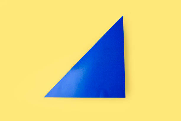 istock DIY and kids creativity, origami bookmark . Step by step instruction: how to make shark from paper. Step2 preparation tools: fold square along diagonal. Children Craft workshop. 1396426213