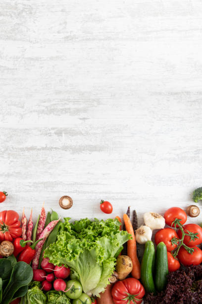 istock Fresh Vegetables on White Wooden Table 1396427353