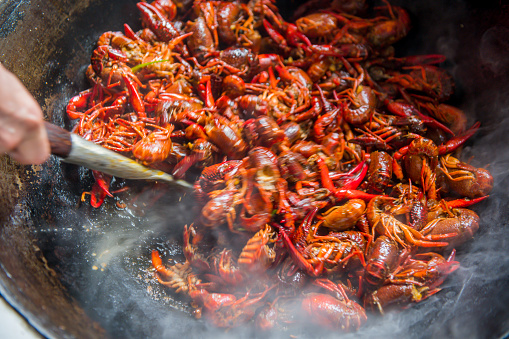 Crayfish is one of the most popular food to Chinese in summer time. The crayfish of photo is a little blurred due to the motion.