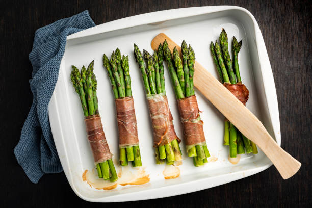 istock Asparagus Wrapped With Parma Ham 1396427543