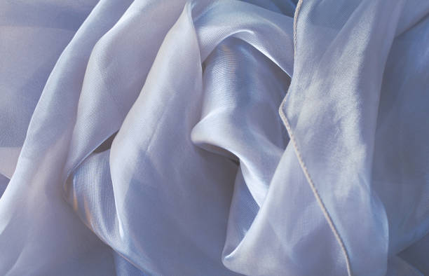 istock Waves of beautiful pink silk fabric 1396429249