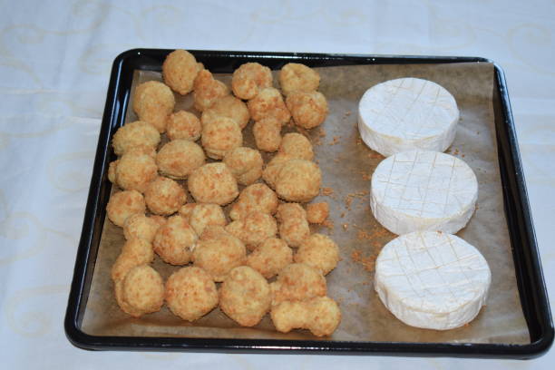 istock breaded mushrooms with cheese, ready to bake 1396435317