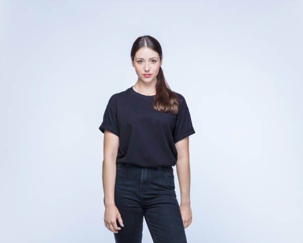 Confident woman against white background