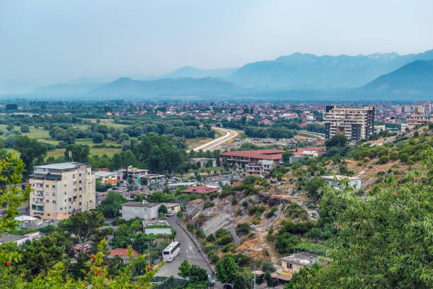 istock Aerial view of Shkoder suburb in a valley among mountains, Albania 1396440792