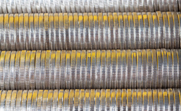 a large number of metal coins are used in eastern Europe a large number of metal coins are used in eastern Europe, a lot of silver-colored steel coins Helical Screw Blowers stock pictures, royalty-free photos & images