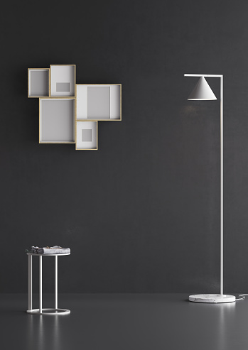 Bathroom on a black wall with  and decorative details such as small paintings. Lacquered stool and floor lamp