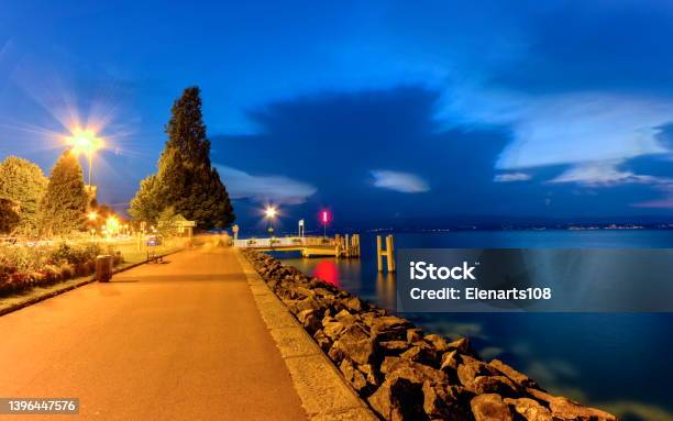 Evianlesbains Promenade Near Geneva Lake France Stock Photo - Download Image Now - Architecture, Bench, Blue