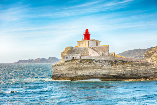 Breathtaking view of lighthouse near old town Bonifacio. Popular travel destination of Mediterranean sea and Corsica. Location: Bonifacio, Corsica; France, Europe