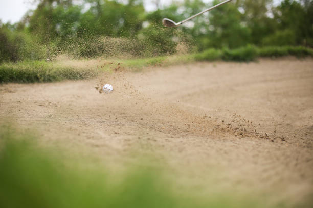 istock Getting out of a sand trap 1396449448