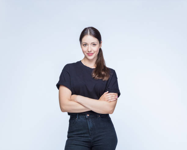 istock Woman with arms crossed against white background 1396452379