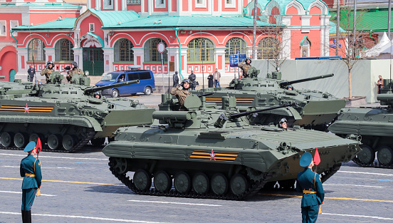Moscow, Russia, May 2022: Infantry fighting vehicles BMP-2M are passing by Red Square on rehearsal of the military parade.