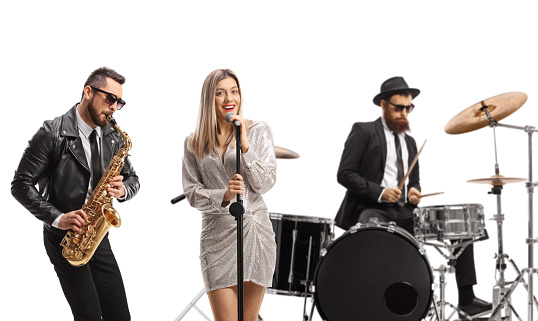 Music band of  drummer, sax player and a female vocalist isolated on white background