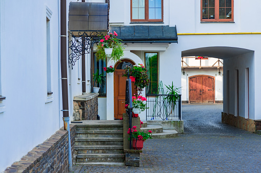 Germany monastery architecture building landmark object with landscaping flowers, windows and stair