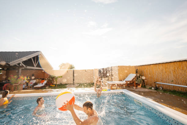 istock Friends at the swimming pool 1396453868