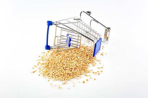 Overturned shopping cart and wheat grain