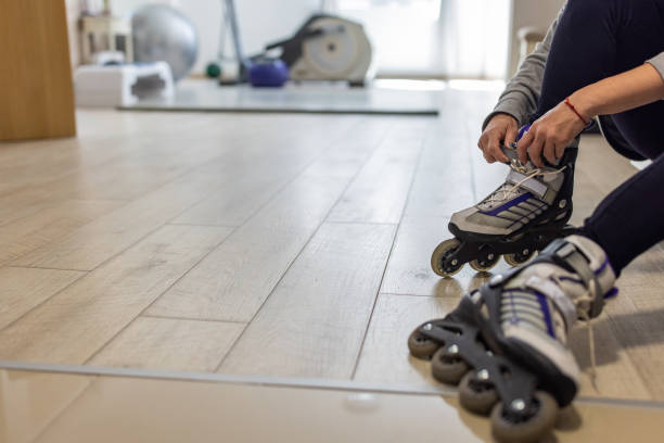 istock Caucasian woman tying her roller skates 1396465973