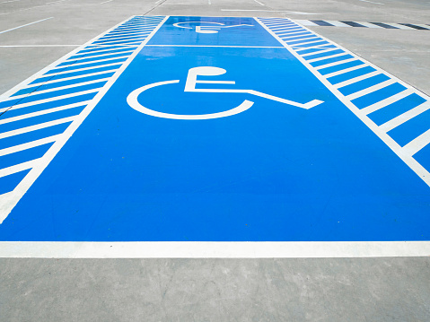 Handicapped parking spot.Disabled parking sign painted.