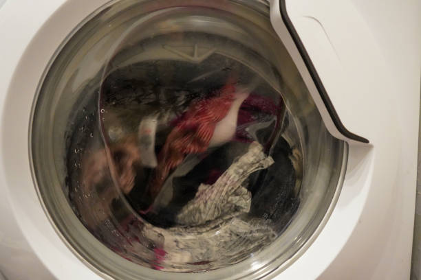 istock Close up of a white washing machine 1396467687