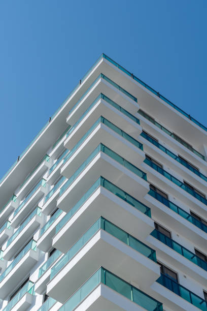 istock Corner of a modern residential high-rise building. 1396469748