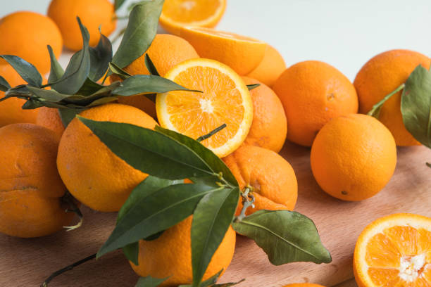 Healthy fruits, orange fruits background.  Slices of citrus fruits - oranges. stock photo