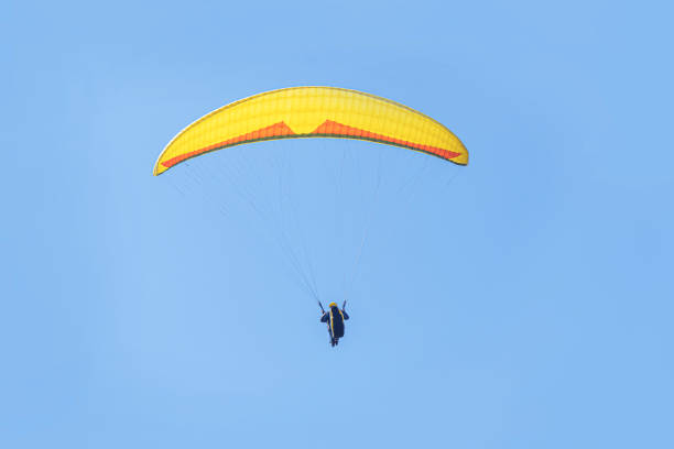 Paragliding on the background of the sky and mountains.