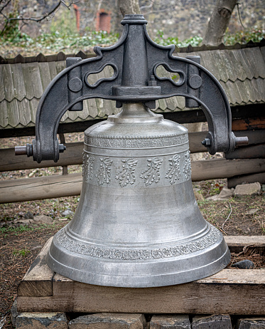 Old church bell. Cast-iron bell close-up.