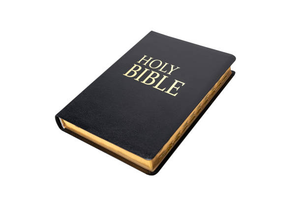 istock Holy Bible isolated on white background, 1396480586