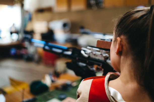 istock Woman sport shooter training 1396480890