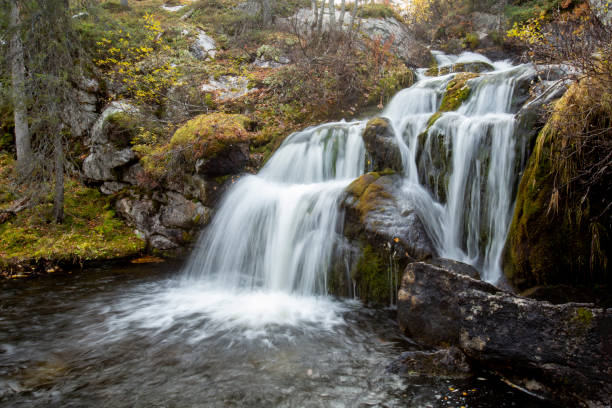 istock Kullaoja waterfall in Northern Finland 1396481470