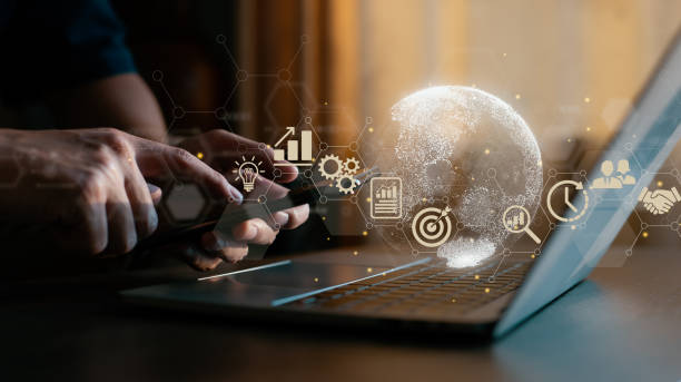 istock He uses a smartphone. Technology for business worldwide internet connection applications, finance and banking, digital link tech, and big data. 1396483276