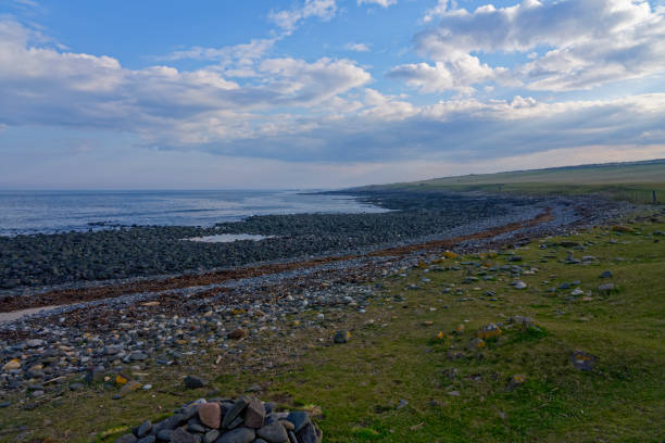 istock Evening falls across a rocky Northumbrian coastline 1396487925