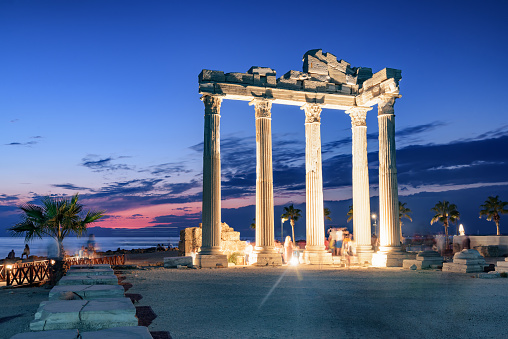 Awesome ruins of the Temple of Apollo on the Mediterranean Sea coast in Side, Turkey. The Roman temple is a popular tourist attraction in Turkey.