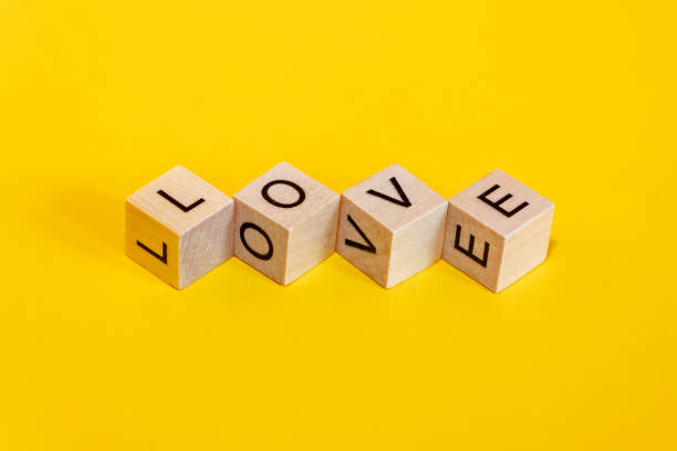 istock Wooden cubes with the word Love. 1396491470