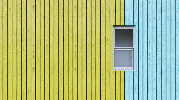 istock white window on wooden wall 1396494780