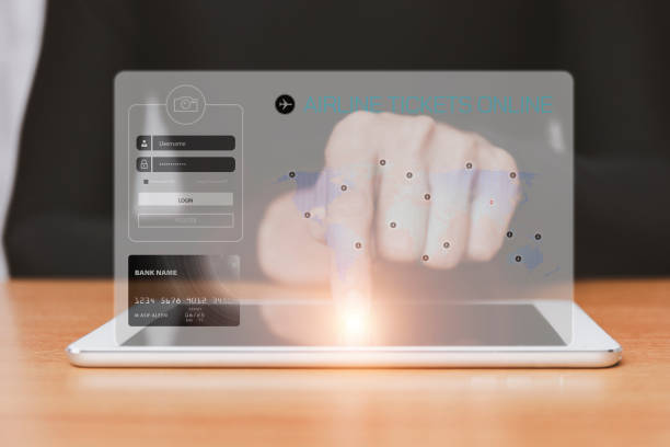 istock Man hands point tablet tablet with application searching air tickets on the screen. Airline tickets online booking application on tablet. 1396494898