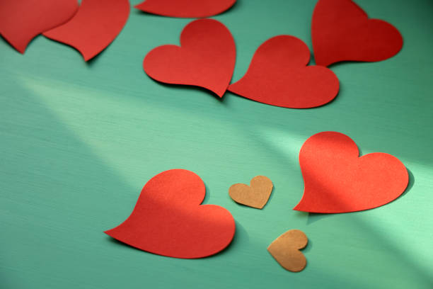 istock Top view heart shapes arrangement with copy space 1396495556