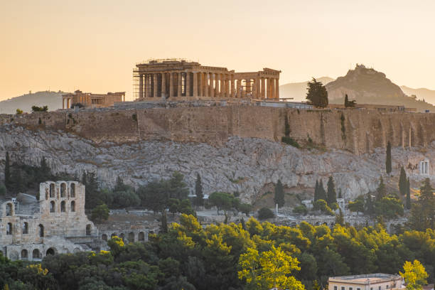 istock View of Acropolis at sunrise from Plaka rooftop, Athens, Greece 1396496576