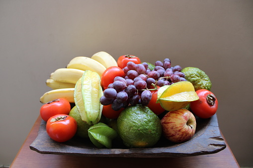 trough with variety of tropical fruits
