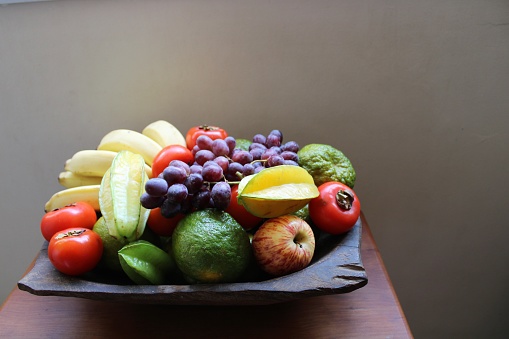 trough with variety of tropical fruits