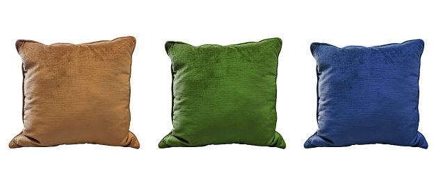 luxury colorful pillows in brown, green, blue color tone isolated on background with clipping path. square velvet cushions for home decoration. nap pillows.