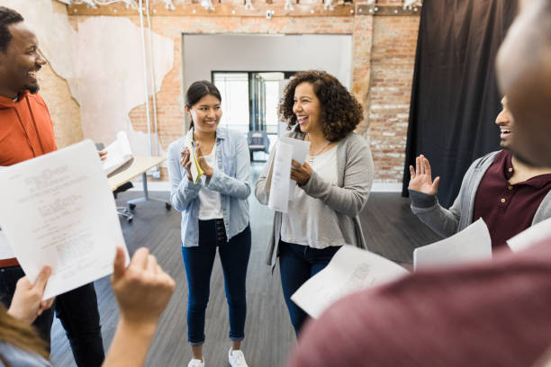 istock Small group is excited to hear who has been chosen 1396502712