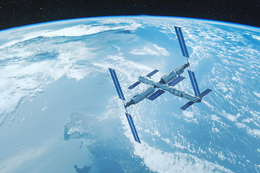 The ISS in its low Earth orbit.