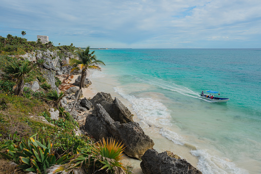 Isla Mujeres, Mexico - June 13, 2013: Beautiful view of the coast of the island of Isla Mujeres, very visited by Cancun tourists due to its crystal blue turquoise waters.