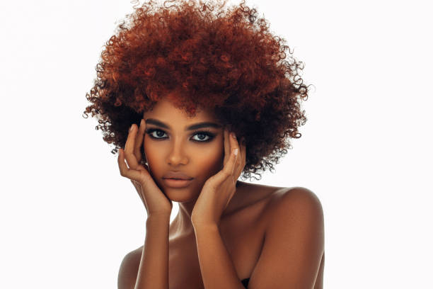 istock Beautiful afro woman with perfect make-up 1396510490
